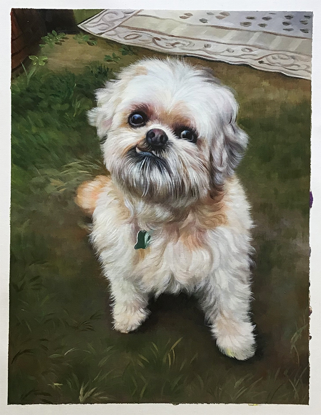 white dog painting in grass